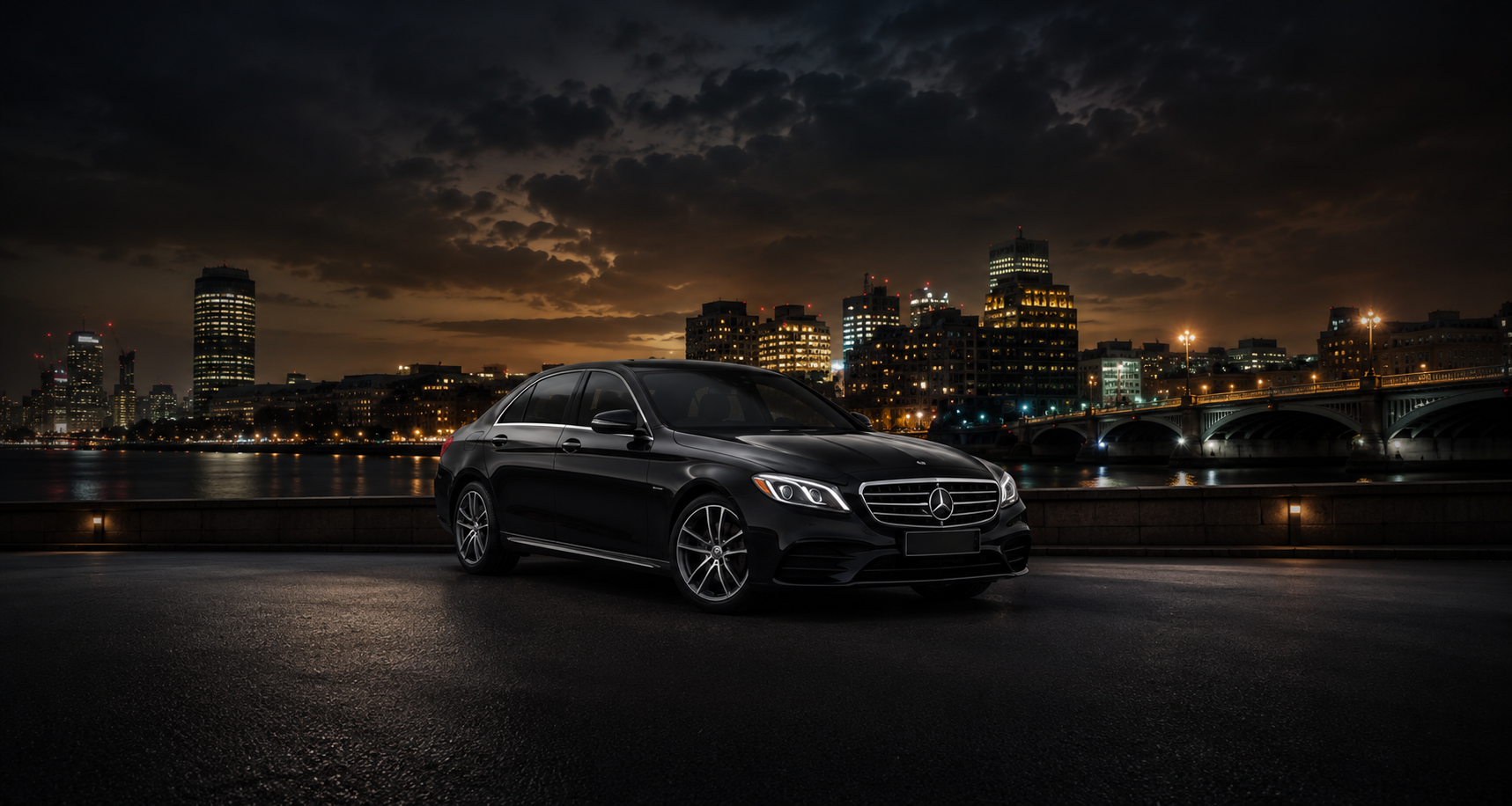 Black Mercedes executive saloon in the city at night